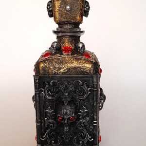 Macabre Skeleton Hand Decanter, Dark Art Apothecary Bottle, Gothic Home Decor, Vampire Relic with Ruby Signet Ring, Oddities and Curiosities