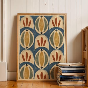 May include: A framed rectangular wall art print featuring a repeating pattern of blue, mustard yellow, sage green, and terracotta red shapes. The design consists of alternating arched motifs and oval forms arranged in a grid within a light wood frame.
