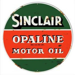 May include: A round, vintage Sinclair Opaline Motor Oil sign. The top half is green, the middle is red, and the bottom is green. The words "SINCLAIR" and "OPALINE MOTOR OIL" are in white lettering.