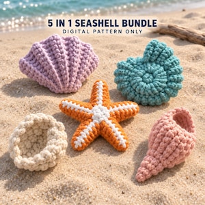May include: A 5 in 1 seashell bundle digital pattern only featuring five crocheted items: a lavender fan shell, a teal spiral shell, an orange and white starfish, a cream-colored round shell, and a pink conch shell, all displayed on sandy ground.