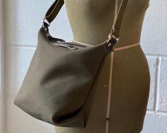 Canvas sling bag - small green