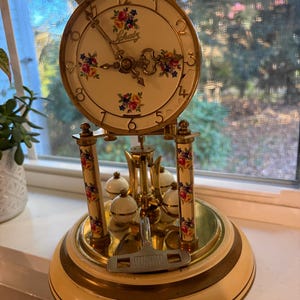 Vintage Schatz Anniversary Clock, German 400 Day Floral Dial, Painted Flower Columns, Glass Dome, Cream Brass Mantel Clock