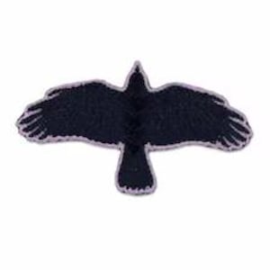 May include: A black embroidered patch in the shape of a bird with its wings fully spread in flight. The bird features detailed stitching to define the feathers and is outlined with a light gray border against a plain white background.