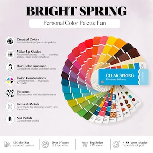 May include: A Bright Spring personal color palette fan featuring a circular arrangement of color swatches in various hues. The fan includes a blue cover labeled Clear Spring and Primavera Brilhante, with text detailing curated colors, makeup, hair, and jewelry.
