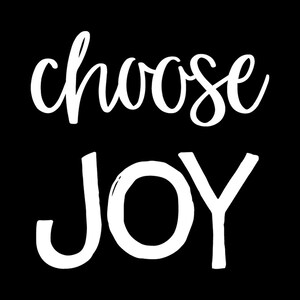 May include: A graphic design featuring the white text choose JOY against a solid black background. The word choose is written in a flowing, cursive script font, while the word JOY is displayed in a bold, uppercase, hand-drawn sans-serif typeface.