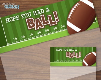 May include: A football-themed party design with a green field background and the text "HOPE YOU HAD A BALL!". Includes a brown football graphic and yard line markings. The design is suitable for custom party decorations.