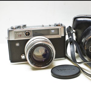 フィルムカメラ E) YASHICA Lynx-14 Yashica: Lynx 14 E Price Guide: estimate a camera value