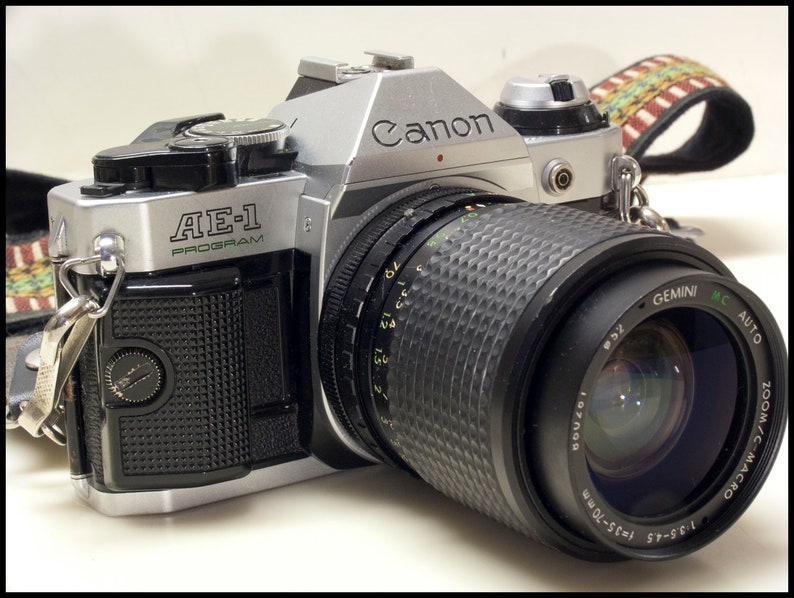 Canon AE-1 Program Camera with Wide to Short Telephoto Lens Vintage Working 1980s 35MM Film SLR with Hippy Neck Strap and Free Shipping