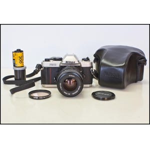 Nikon FM10 Camera Zoom Nikkor Lens 35MM Film SLR Vintage 1990s