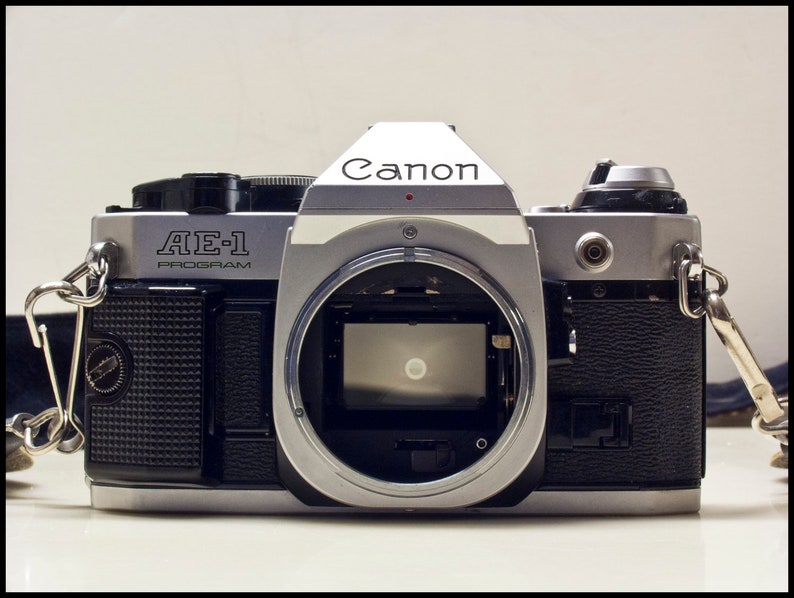 Canon AE-1 Program Camera with Wide to Short Telephoto Lens Vintage Working 1980s 35MM Film SLR with Hippy Neck Strap and Free Shipping