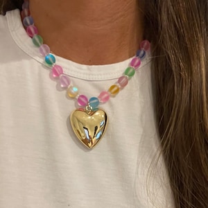 multicolor beaded heart necklace with large gold heart charm; heart necklace