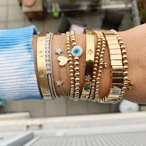 14k gold filled evil eye beaded bracelet; evil eye bracelet; evil eye; gold beaded bracelet