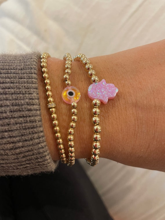 Yellow and Pink Pastel Iridescent Crystal Hamsa Necklace Yellow and Pink Pastel Iridescent Crystal Hamsa Necklace