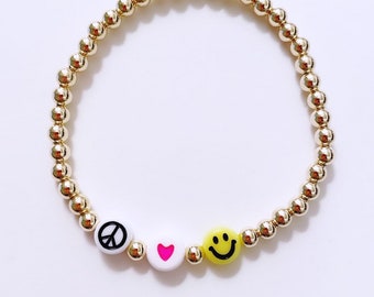 14k gold filled beaded bracelet with peace sign bead, heart, smiley ; gold filled stack bracelets; peace bracelet