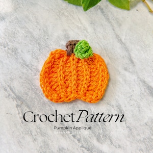 May include: Crochet pattern for a pumpkin applique. The pumpkin is orange and has a green stem. The text "Crochet Pattern" and "Pumpkin Applique" is visible in the image.