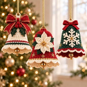 Three handmade crochet bell ornaments hanging from a Christmas tree with warm lights and traditional festive decorations.