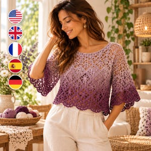May include: A crochet top featuring a gradient color pattern that transitions from a light lavender at the neckline to a deep purple at the scalloped hem and sleeves. The garment is constructed with an openwork floral motif design.