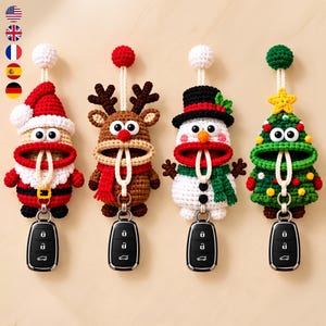 May include: Four crocheted key covers featuring holiday characters: a Santa Claus, a reindeer, a snowman, and a Christmas tree. Each figure has a white cord loop with a ball at the top and a metal ring at the bottom holding a black car key fob.