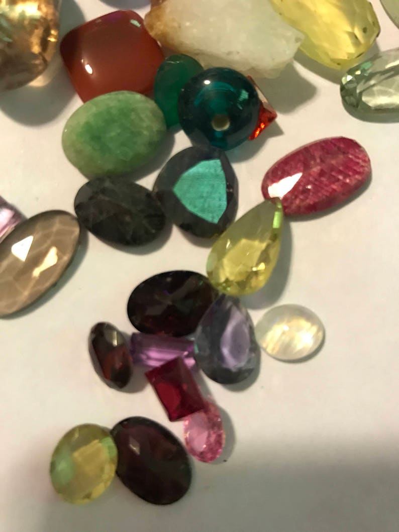 Bag of natural and glass gemstones