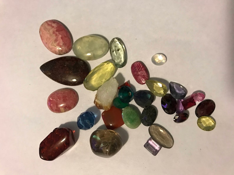 Bag of natural and glass gemstones