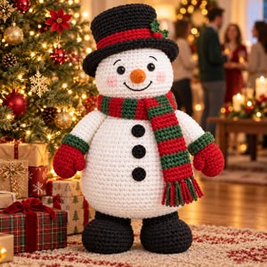 May include: A white crocheted snowman doll featuring a black top hat with a red band, a red and green striped scarf, red mittens, and black boots. The snowman has three black buttons on its torso, a small orange nose, and pink cheeks.