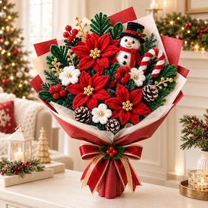 May include: A festive bouquet featuring crocheted red poinsettias, white flowers, green pine sprigs, red berries, pinecones, a small crocheted snowman wearing a black hat, and a candy cane, all wrapped in red and white paper with a red ribbon.