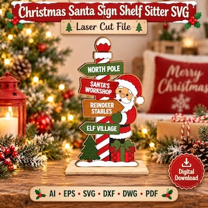 Op de afbeelding: Een houten decoratiebord met een rood-wit gestreepte paal en vier wegwijzers met de tekst North Pole, Santa's Workshop, Reindeer Stables en Elf Village, vergezeld door een kerstmanfiguur en een cadeauverpakking.