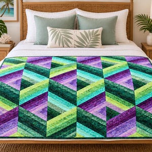 May include: A rectangular quilt featuring a geometric pattern of repeating triangles. The design consists of diagonal fabric strips in shades of deep forest green, bright lime green, turquoise, and various tones of purple, creating a vibrant mosaic.