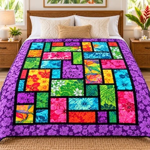 May include: A quilt featuring a patchwork design of rectangular blocks with vibrant tropical floral and foliage prints in shades of purple, pink, blue, green, yellow, and orange, bordered by a purple fabric with a repeating floral pattern.