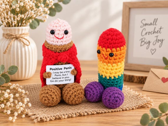 A hand-crocheted adult humor plush doll at $4 — the kind of absurd, genuinely handmade desk ornament that makes a coworker do a double-take.