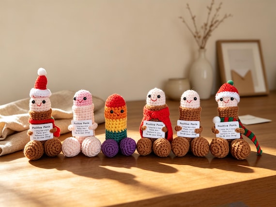 A hand-crocheted anatomically-inspired amigurumi doll that's equal parts absurd and impressively crafted — someone actually sat down and *made* this thing.