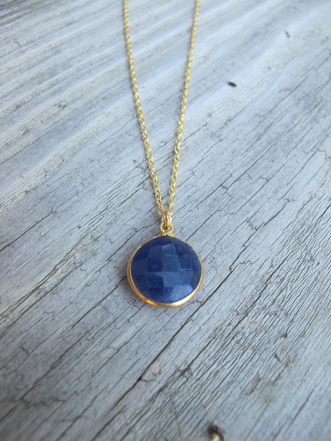 Gold necklace with sapphire stone deals