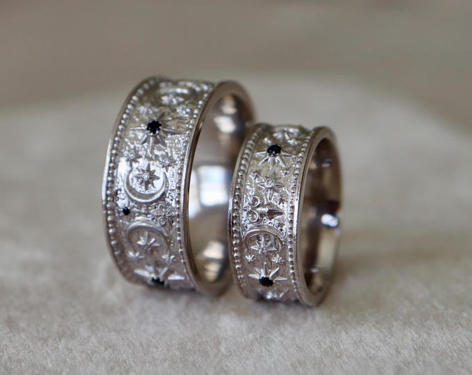 Celestial Fleur-de-Lis His & Hers Wedding Bands