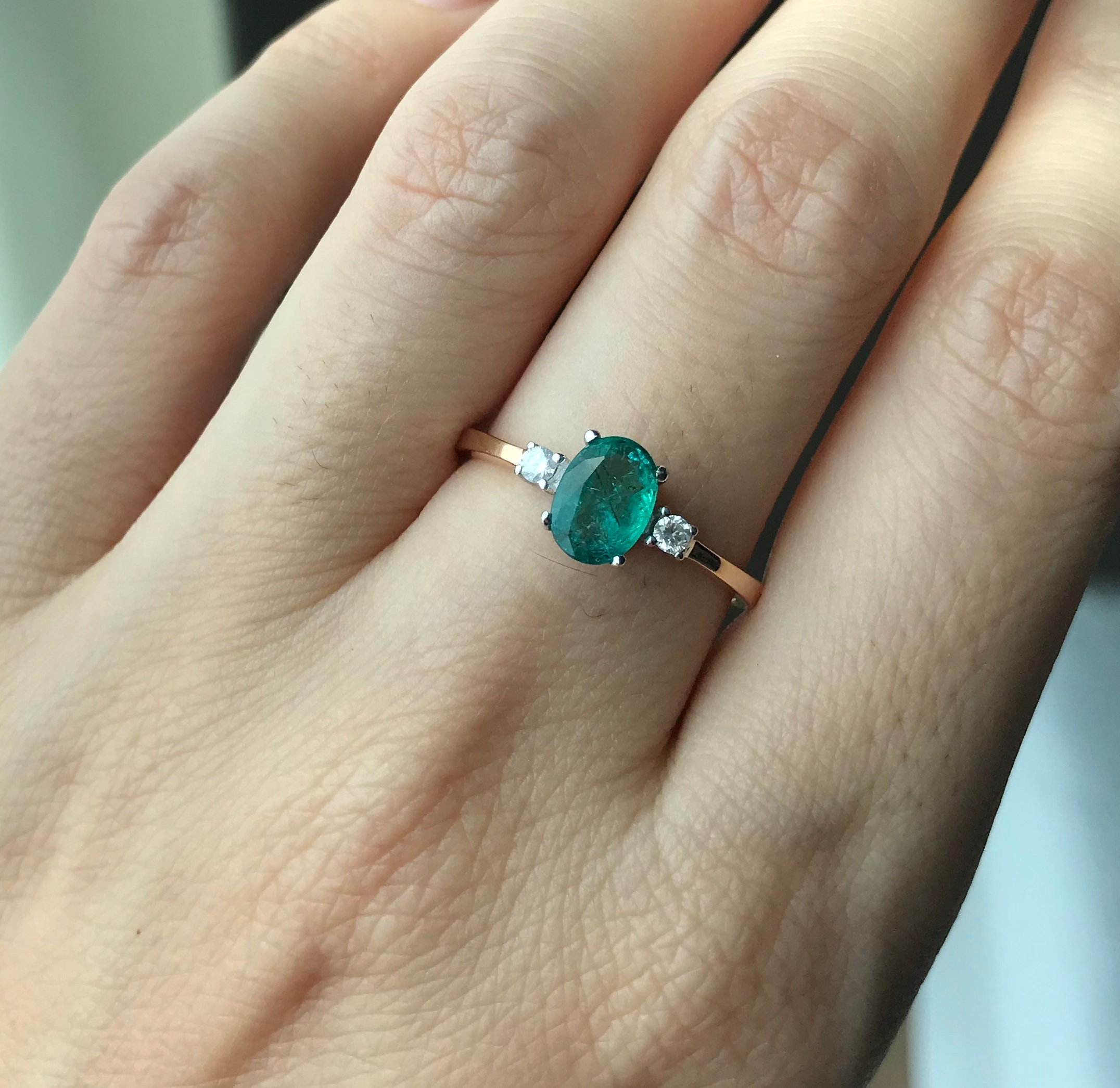 Oval Emerald Three Stone Engagement Ring