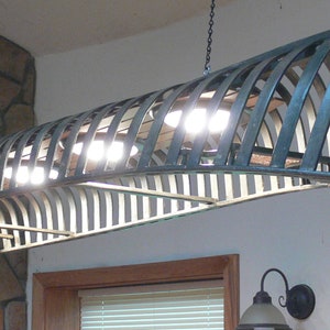 This Old Canoe, a 96" Skeleton Canoe Chandelier