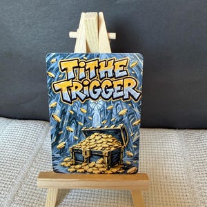 May include: A rectangular game card titled Tithe Trigger featuring a blue-toned illustration of a treasure chest overflowing with gold coins, displayed on a small wooden easel. The card shows coins floating in the air against a stone background.