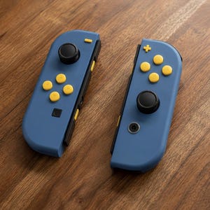 Anpassade Nintendo Switch Joy Con - Airforce blå och gula knappar inklusive nya original Joy Cons