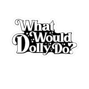 May include: A die-cut sticker featuring the black text What Would Dolly Do? in a bold, stylized, cursive-inspired font. The design includes small white star accents scattered throughout the lettering, all set against a solid black background.