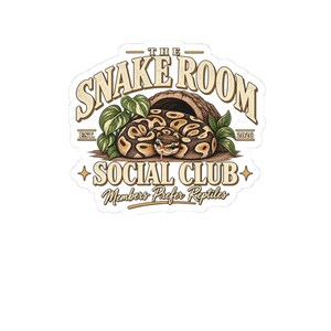 May include: A die-cut sticker featuring a brown and tan patterned snake emerging from a hollow log. The text reads THE SNAKE ROOM SOCIAL CLUB, EST. 2026, and Members Prefer Reptiles. Green leaves flank the log, all set against a white background.