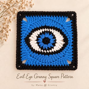 May include: A square crochet piece featuring an evil eye design in black, white, and blue yarn. The center is black, surrounded by concentric rings of blue and white, framed by a black border. Text below reads: Evil Eye Granny Square Pattern by Mama & Granny.