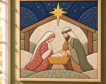 May include: A square fabric wall art piece in a light wood frame depicting a nativity scene. The design features a gold star above a manger with two figures in red and green patterned robes, set against a dark blue starry night sky.
