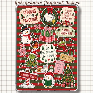 May include: A rectangular holographic physical insert featuring a festive Christmas pattern with red and green stripes. It displays various holiday-themed stickers including Snoopy, a snowman, Kermit the Frog, the Grinch, and text like Reading is my favourite.