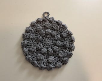 Gray potholder, hot pad, trivet