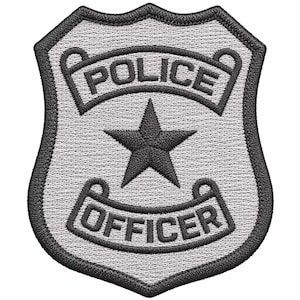 May include: A shield-shaped embroidered patch featuring a light grey background with a thick black border. The patch displays a centred black five-pointed star with the word POLICE arched above and the word OFFICER arched below in black text.