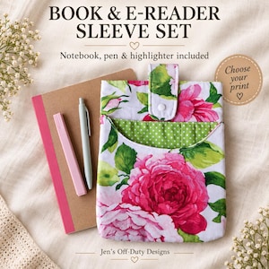 May include: A fabric book and e-reader sleeve featuring a white background with large pink floral patterns and green leaves, a green and white polka dot interior, and a snap closure. Includes a brown notebook, a pink highlighter, and a gray pen.