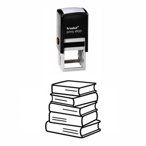 May include: A black Trodat Printy 4933 self-inking stamp featuring a white top label and a rectangular base. Below the stamp is a black and white line art illustration of a stack of five books, each depicted with simple horizontal lines on the spine.
