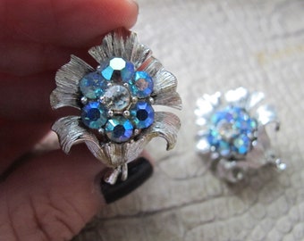 1960's Coro Silver Tone Rainbow Blue Aurora Borealis Rhinestone Flower Earrings. Designer Signed Costume Earrings, Fashion Clip Back On