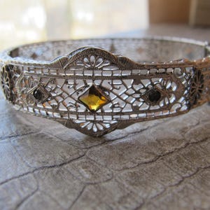 Rhodium Filigree Hinged Art Deco Bangle Bracelet, Safety Chain, Citrine Paste Glass As Is Stone, Early 20th Century Fashion Costume Jewelry