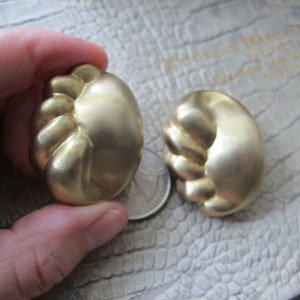 Statement Satin Gold Tone Big Clip On Earrings. Designer Style & Quality. Avant Garde Gold Tone Fashion Jewelry. Big Bold Gold Earrings