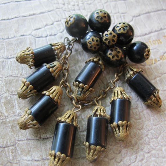 Early Miriam Haskell Unsigned Cascading Bead Stat… - image 1